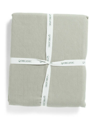 IBENA queen-size organic cotton blanket in asphalt gray, folded and tied with white ribbon – 90 x 90 inches