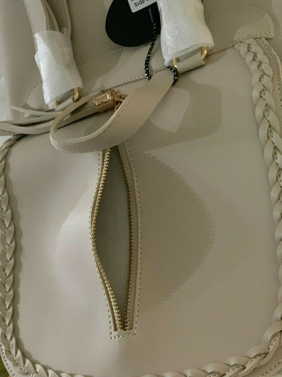 IMOSHION stone convertible backpack with tassel accent and flap front