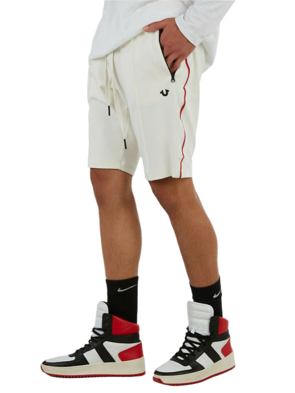 Men’s off-white logo shorts with drawstring waist, zip pockets, and horseshoe logo – shown on model