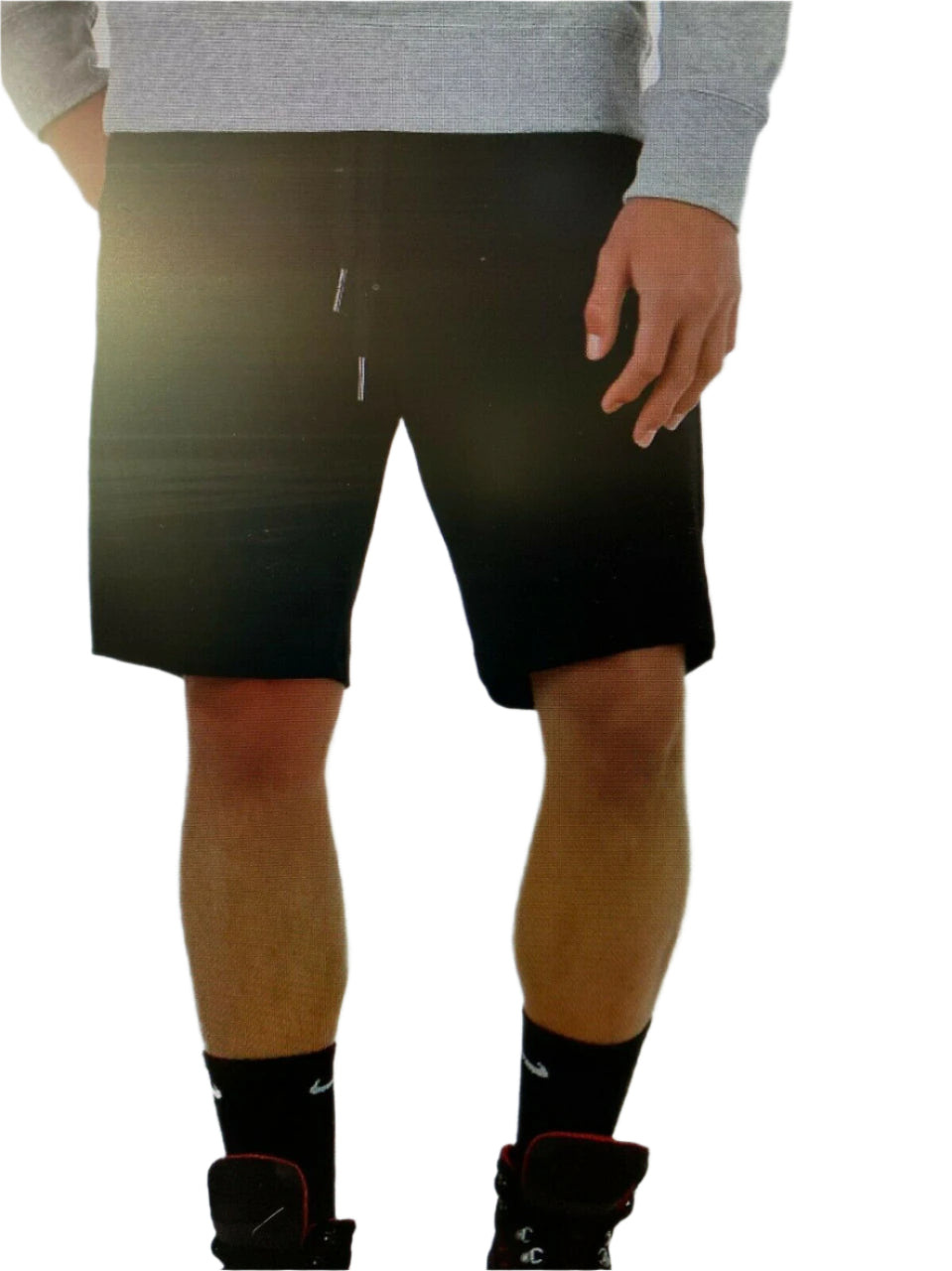 Men’s off-white logo shorts with drawstring waist, zip pockets, and horseshoe logo – shown on model