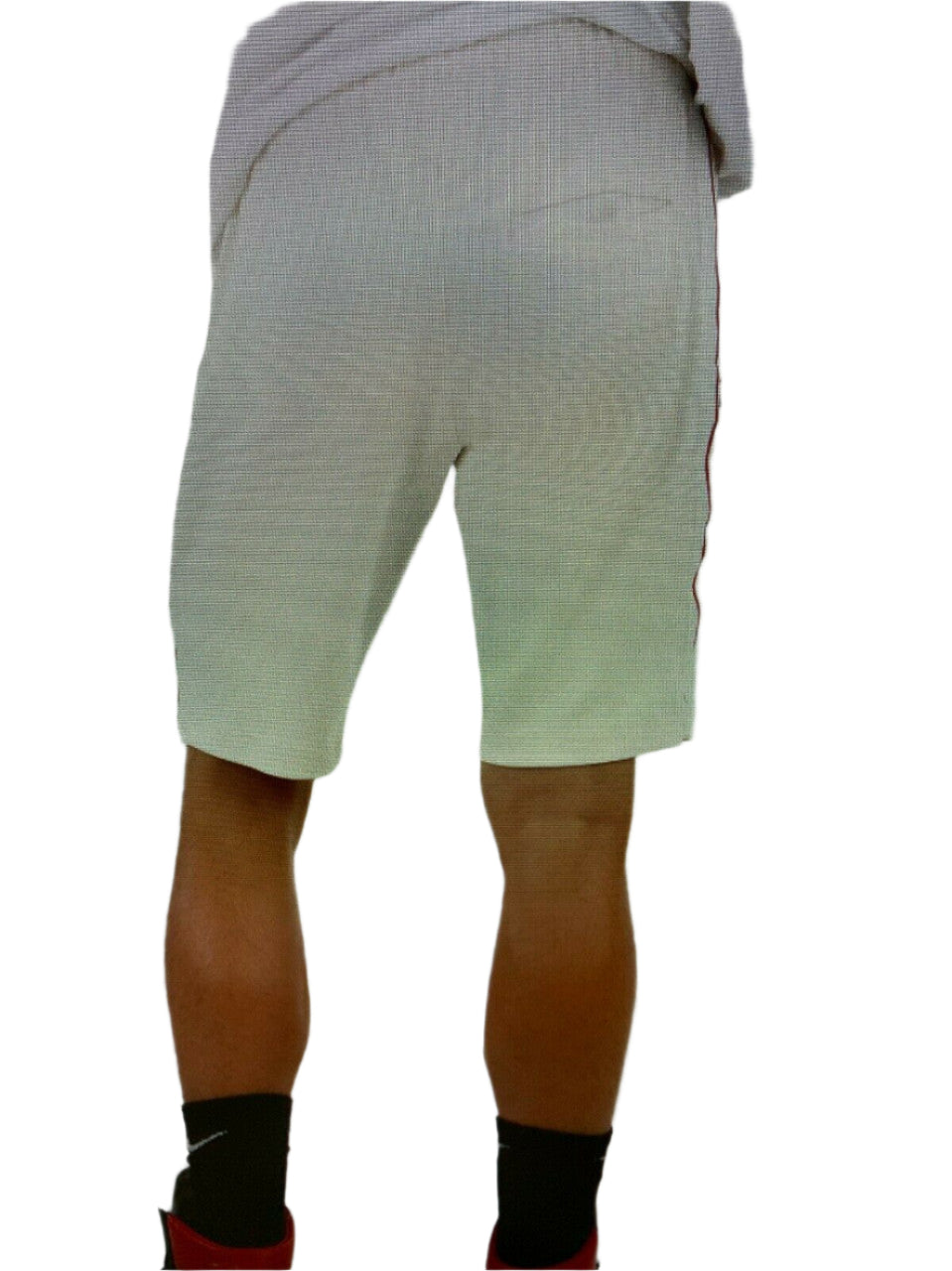 Men’s off-white logo shorts with drawstring waist, zip pockets, and horseshoe logo – shown on model