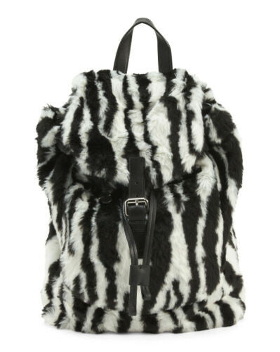 Unisex faux fur backpack with black and white striped design, buckle closure, and leather accents – made in Italy