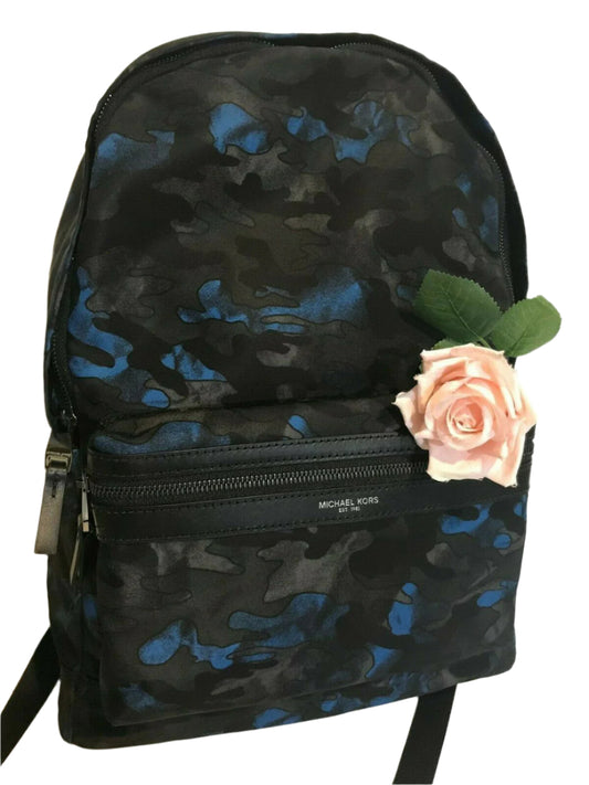 Men’s midnight camo backpack with nylon exterior, leather trim, and padded shoulder straps